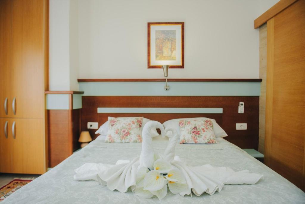 Postel nebo postele na pokoji v ubytování Hotel - Villa Lejla