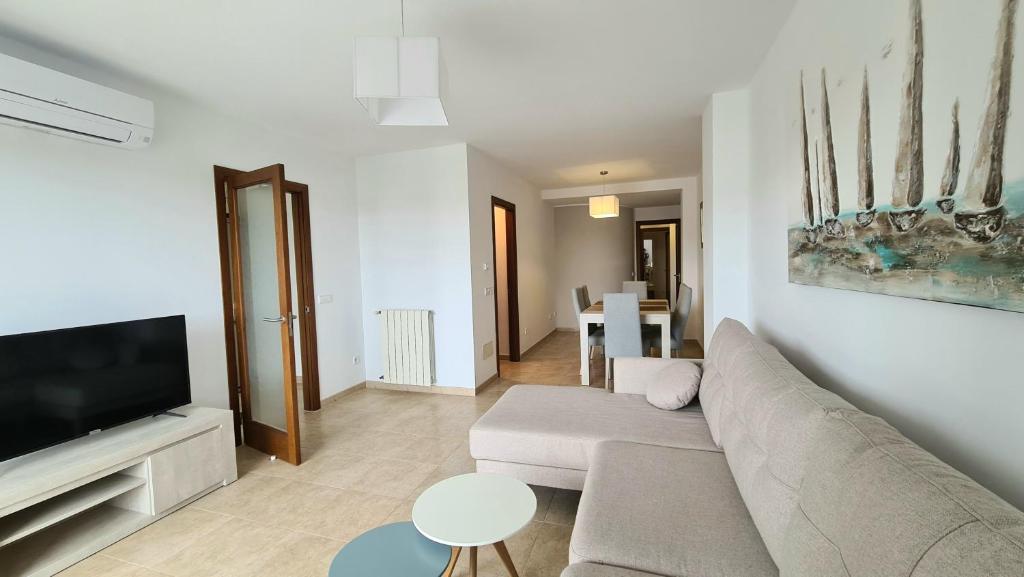 TV a/nebo společenská místnost v ubytování Dimi Holidays Porto Cristo SLU Meerblick Apartment 2 -Hafen Porto Cristo 120 m zum Strand