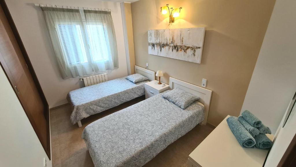 Postel nebo postele na pokoji v ubytování Dimi Holidays Porto Cristo SLU Meerblick Apartment 2 -Hafen Porto Cristo 120 m zum Strand