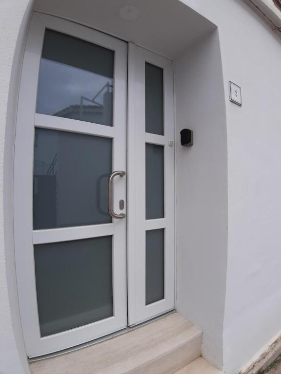 Kép CASA ALEXSA Intero appartamento o CAMERA ALEXSA Camera matrimoniale con patio szállásáról Tortolìban a galériában