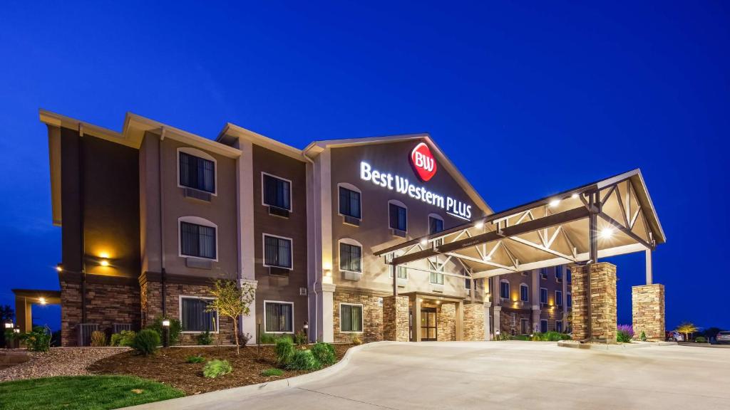 a rendering of a hotel at night at Best Western Plus Overland Inn in Fort Morgan