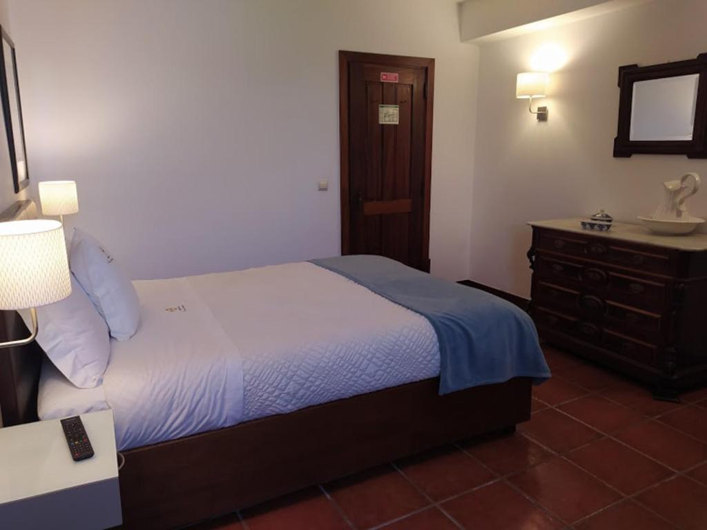 Postel nebo postele na pokoji v ubytování Casa de Sequiade
