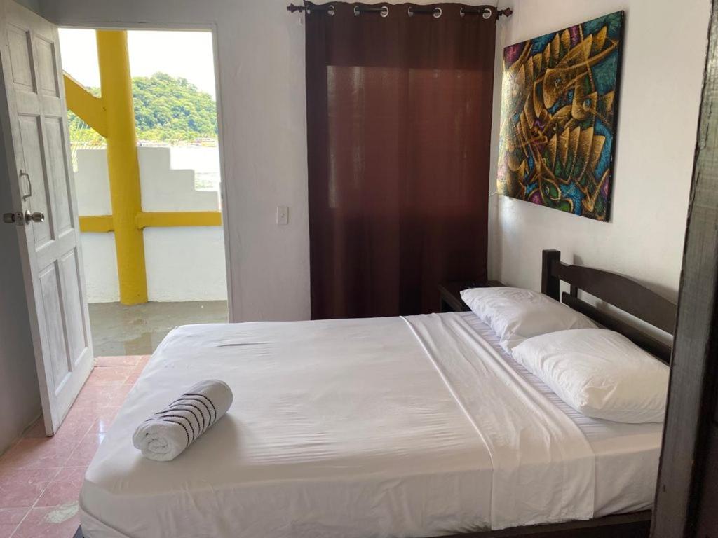 Cama o camas de una habitación en Hotel Cocotal