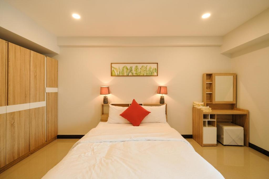 Postel nebo postele na pokoji v ubytování U Sabai Hotel Bangkok