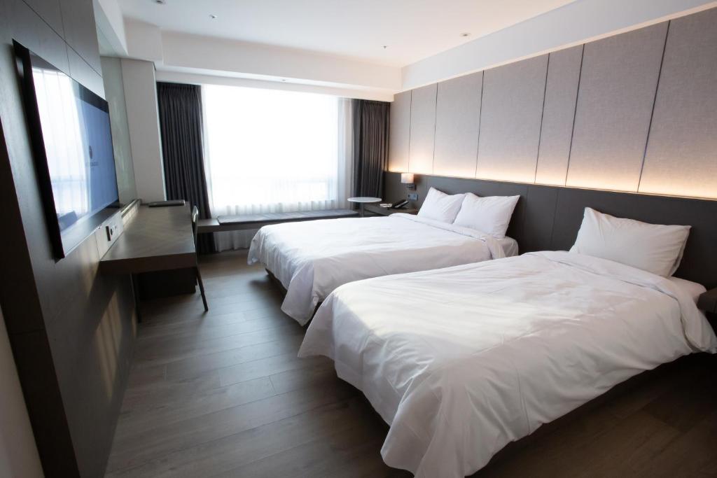 Postel nebo postele na pokoji v ubytování Hotel Interburgo Exco