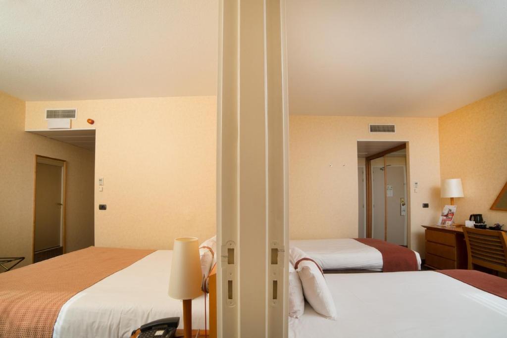 Postel nebo postele na pokoji v ubytování Holiday Inn Gent Expo by IHG
