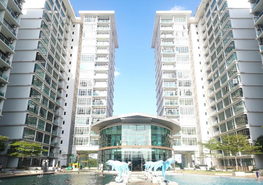 two statues of horses in front of a building at Palazio AegeanSea Homestay By Easyhomestay in Johor Bahru