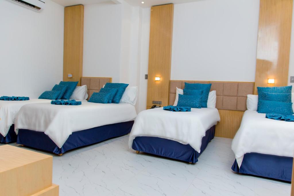 Кровать или кровати в номере L'ver Hotel