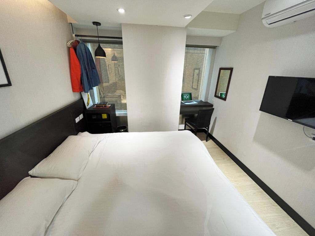 Voodi või voodid majutusasutuse Formosa 101 Taipei Main Branch toas