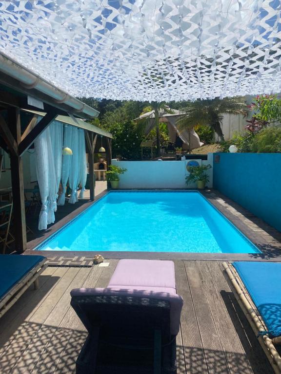 Bazén v ubytování SERENITY piscine au sel nebo v jeho okolí