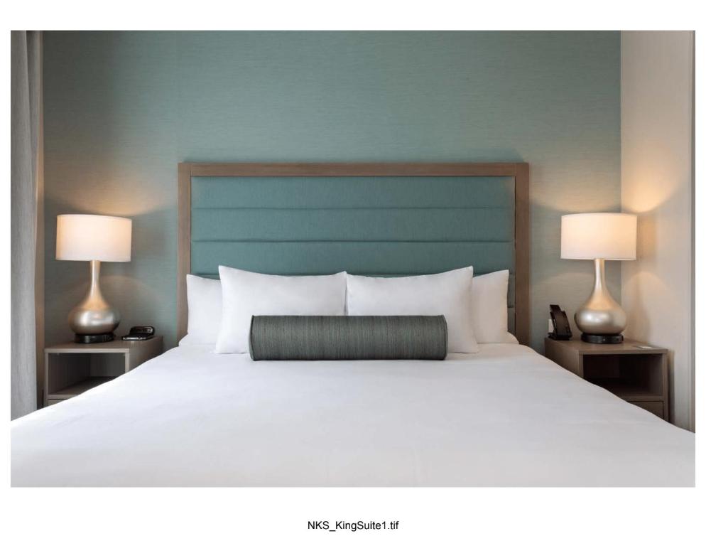 Ein Bett oder Betten in einem Zimmer der Unterkunft Homewood Suites By Hilton Panama City Beach, Fl