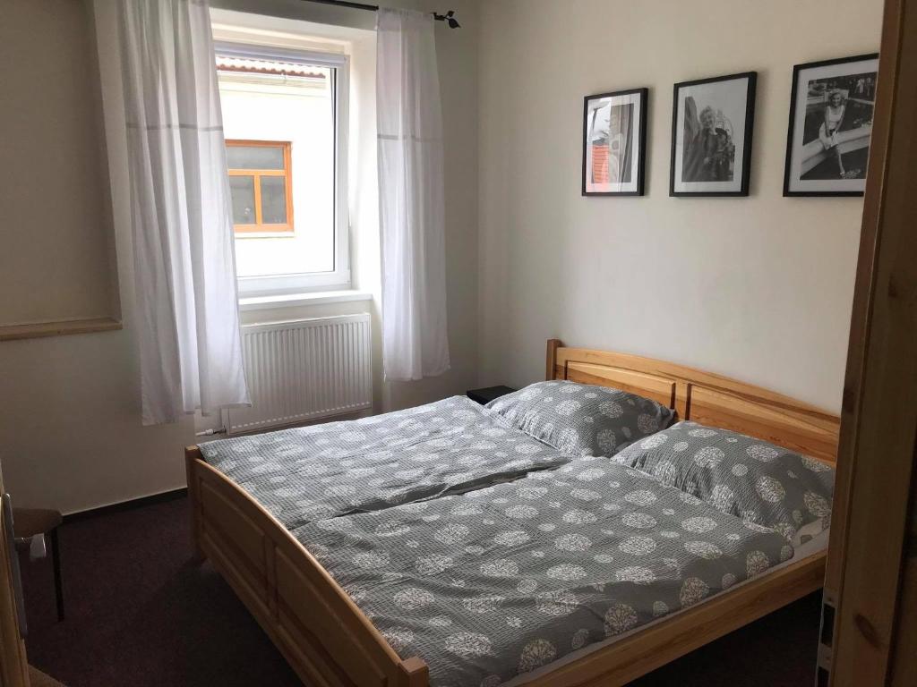 Postel nebo postele na pokoji v ubytování Hotel Pod Stráží