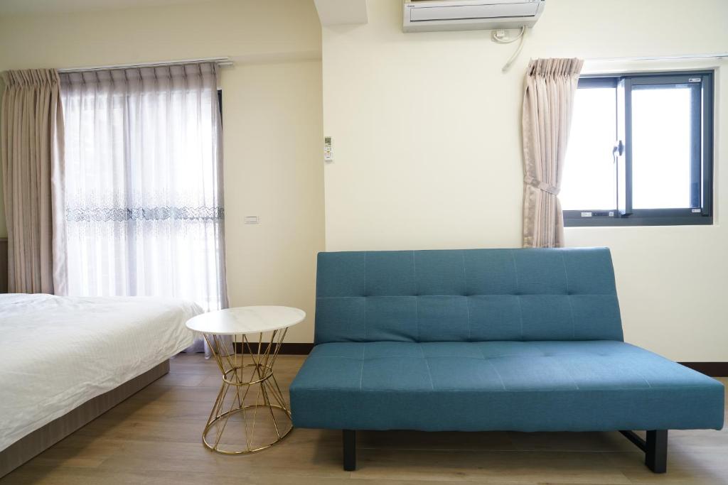 Postel nebo postele na pokoji v ubytování 享悅二館電梯民宿