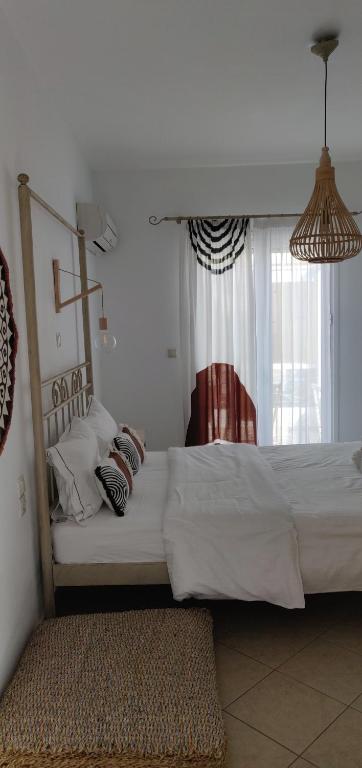 Kalomoira's Apartmentsにあるベッド