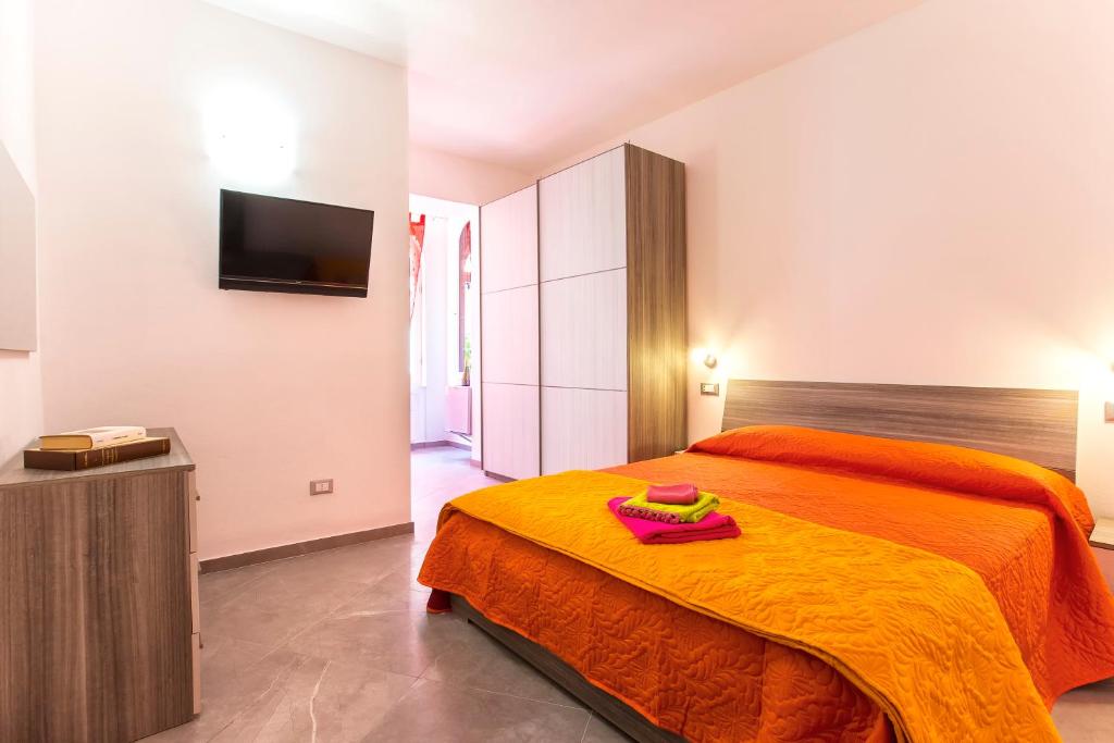 Postel nebo postele na pokoji v ubytování Nonna Adelina Apartments & rooms