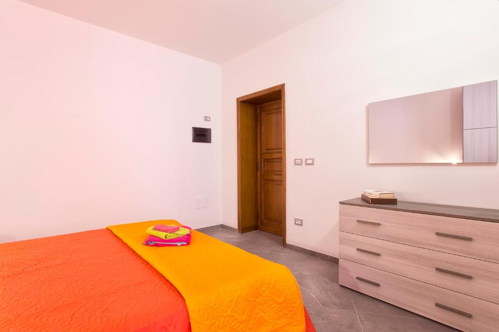 Postel nebo postele na pokoji v ubytování Nonna Adelina Apartments & rooms