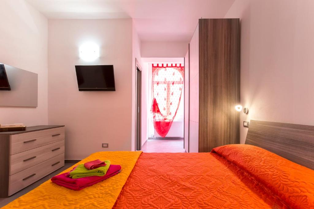 Postel nebo postele na pokoji v ubytování Nonna Adelina Apartments & rooms