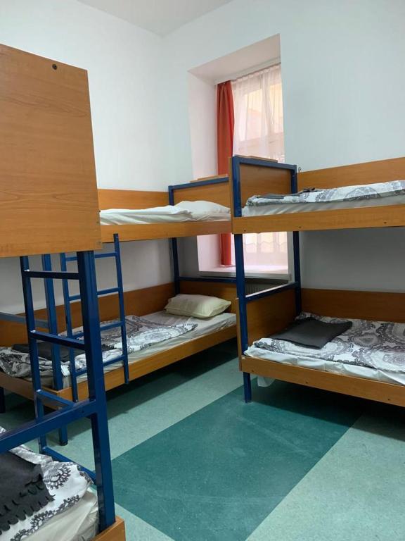 Postel nebo postele na pokoji v ubytování Schronisko na Wyspie