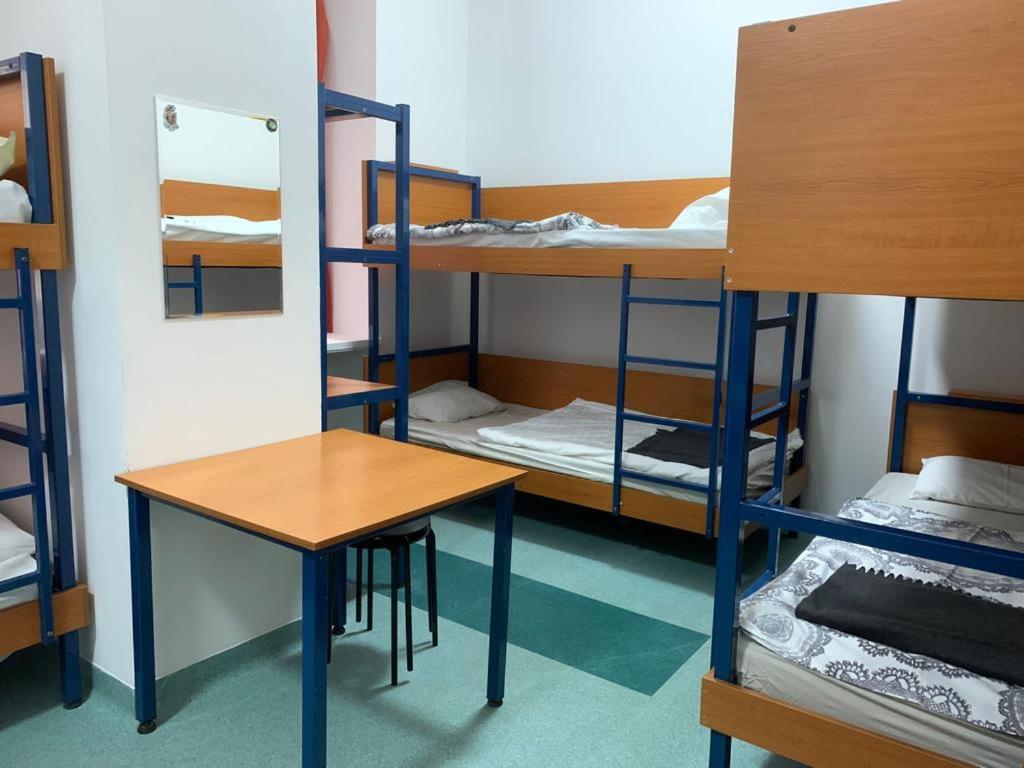 Postel nebo postele na pokoji v ubytování Schronisko na Wyspie