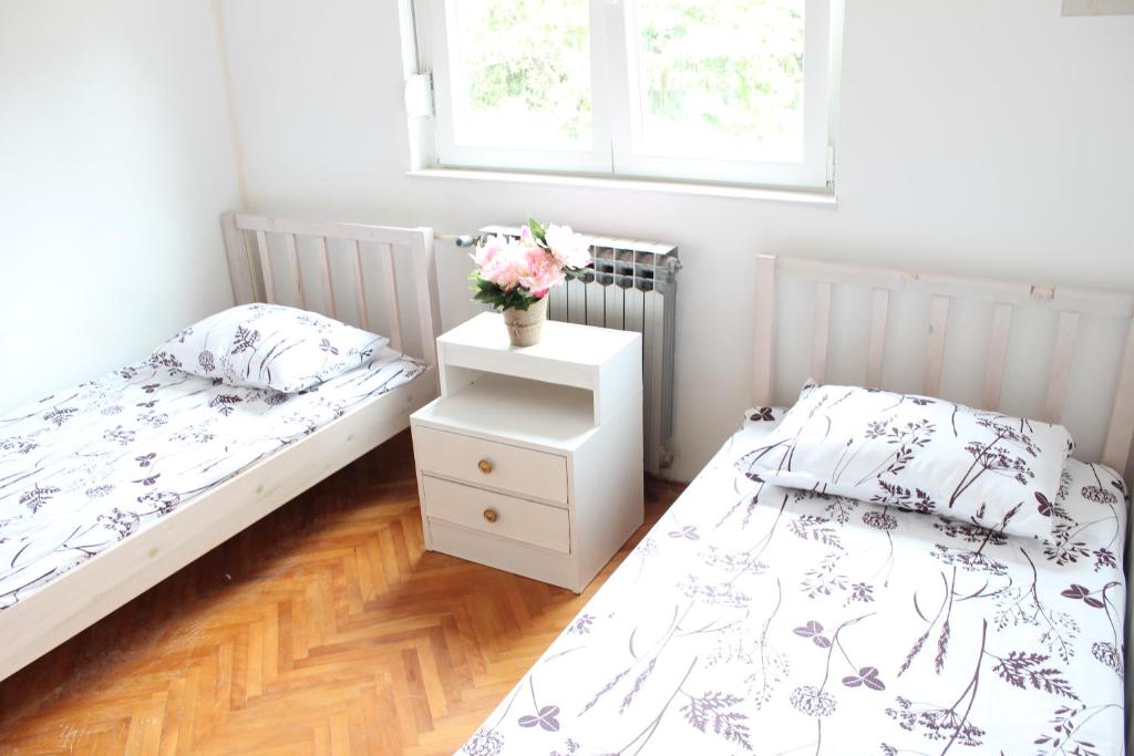 Łóżko lub łóżka w pokoju w obiekcie Pierre's Place