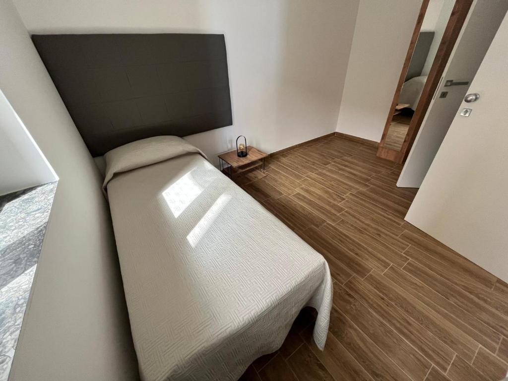 Łóżko lub łóżka w pokoju w obiekcie B&B DEA Gela
