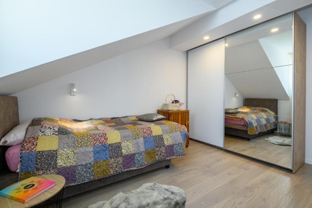 Postel nebo postele na pokoji v ubytování Apartments Rašica