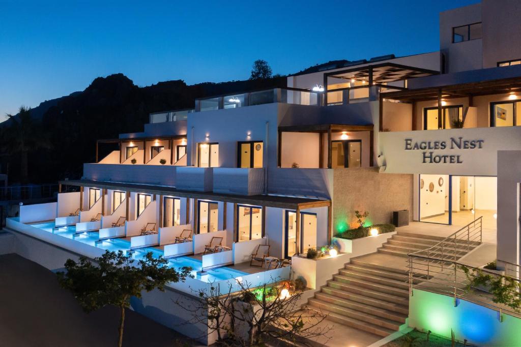 a view of the eolis nest hotel at night at Eagles Nest in Pefki