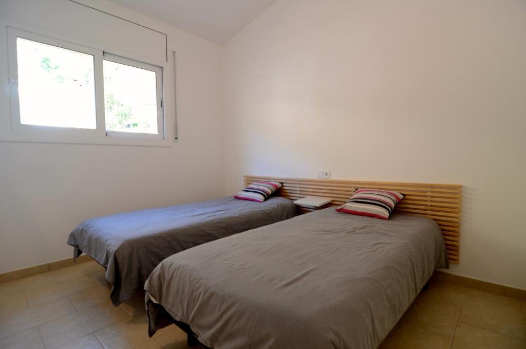 Posteľ alebo postele v izbe v ubytovaní Montseny 3 - Piscina Privada