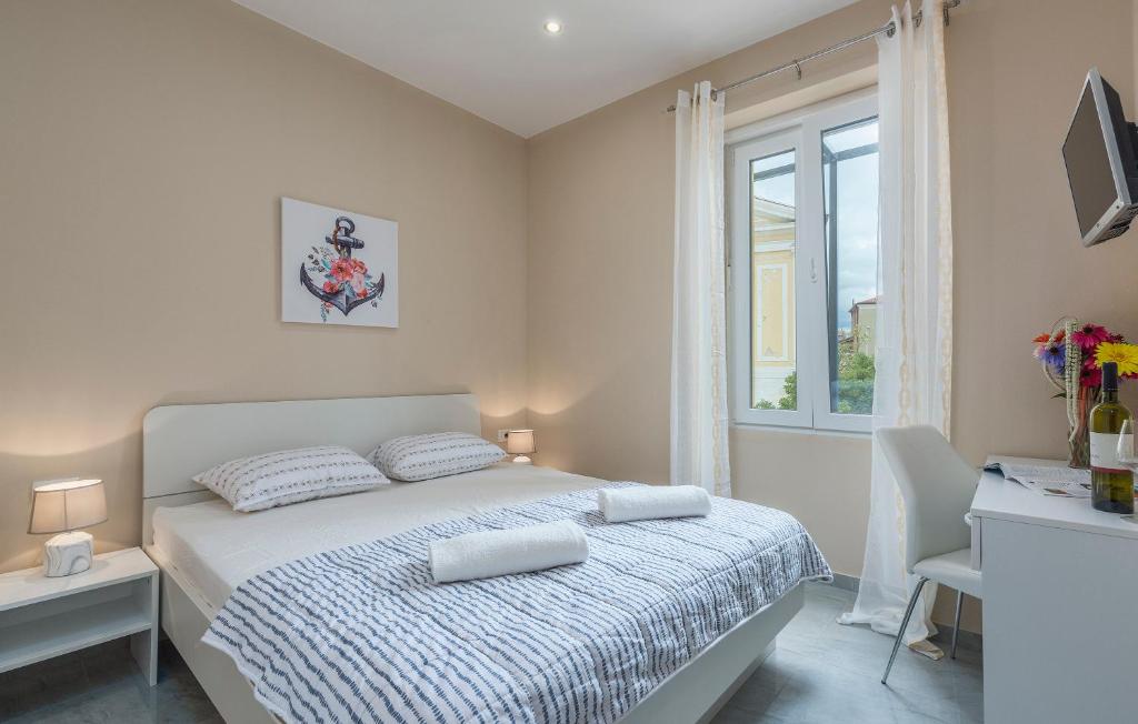 Postel nebo postele na pokoji v ubytování Roberto rooms