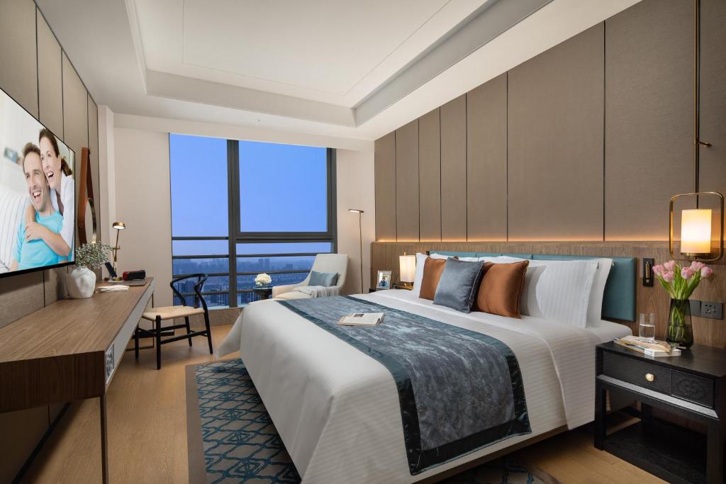 Ascott M-City Foshan客房内的一张或多张床位