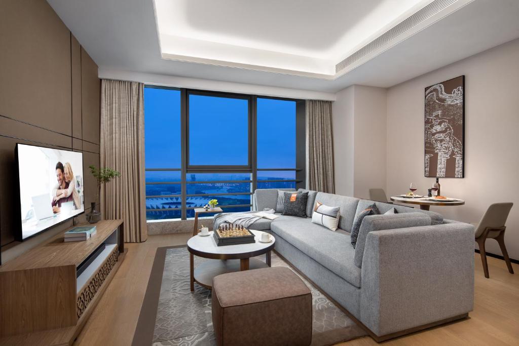 Ascott M-City Foshan的电视和/或娱乐中心