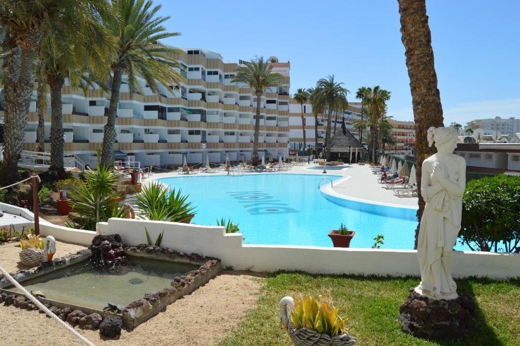 a view of a swimming pool in a resort at Koka View in Playa del Ingles