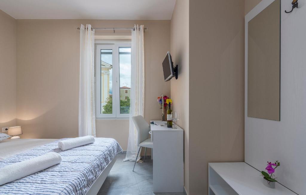 Postel nebo postele na pokoji v ubytování Roberto rooms