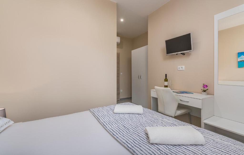 Postel nebo postele na pokoji v ubytování Roberto rooms