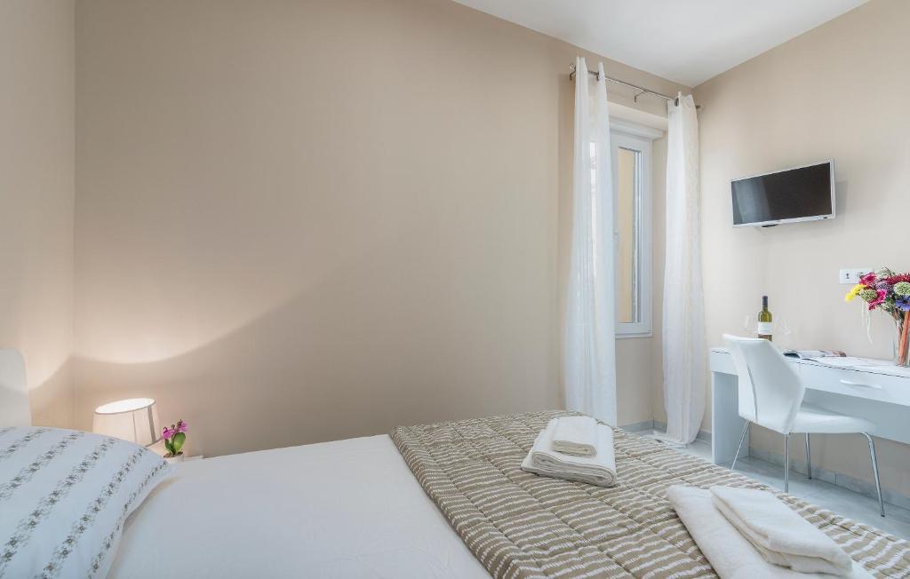 Postel nebo postele na pokoji v ubytování Roberto rooms
