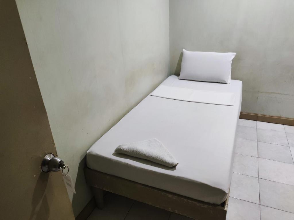 Postel nebo postele na pokoji v ubytování Parkview Hotel
