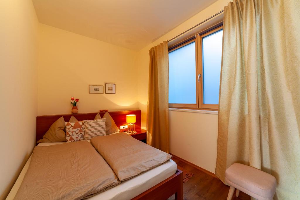 Postel nebo postele na pokoji v ubytování Apartment Matthäus