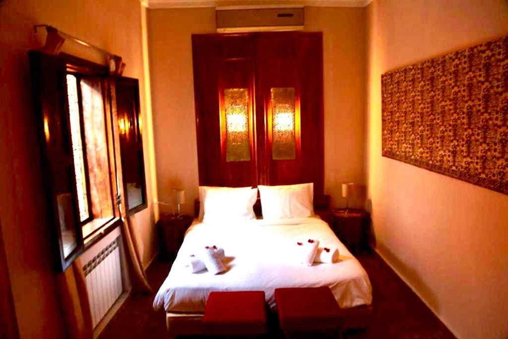Postel nebo postele na pokoji v ubytování Riad Rêve d Antan , Real Dream