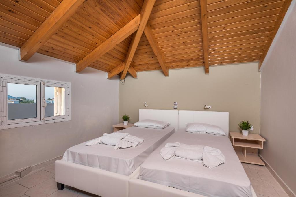 Postel nebo postele na pokoji v ubytování Maui