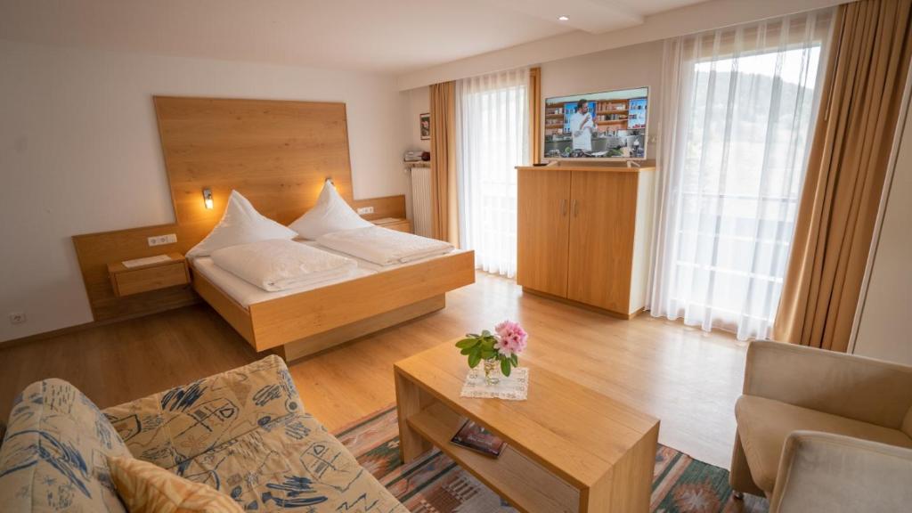 Postel nebo postele na pokoji v ubytování Gästehaus Wissler