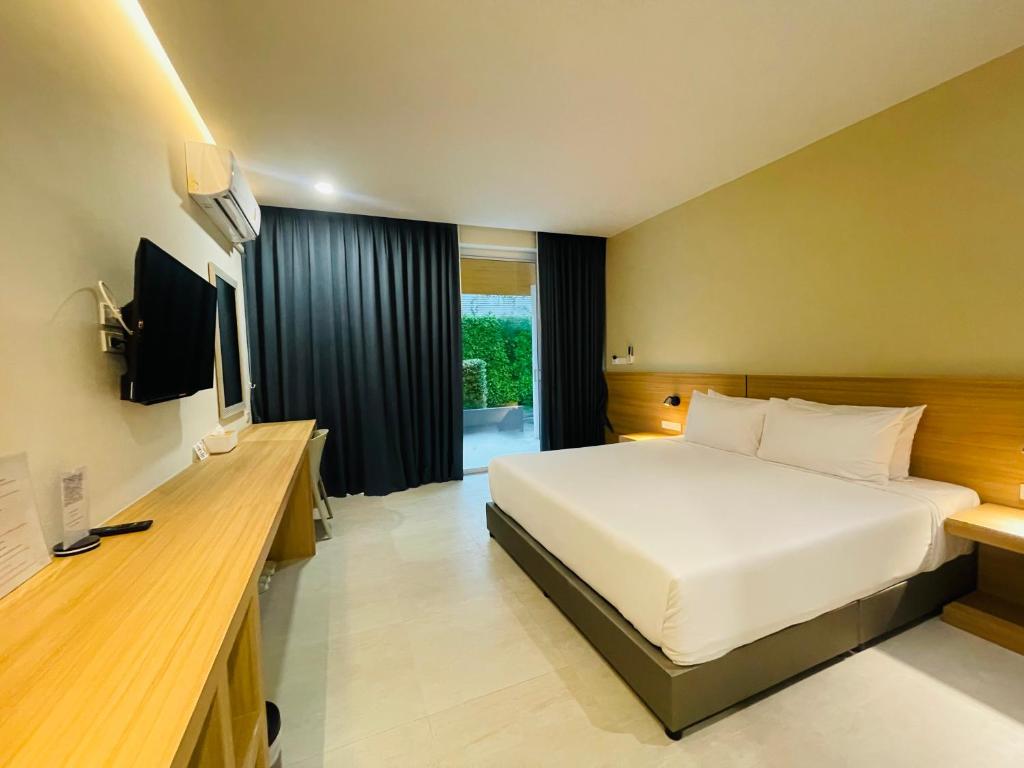 ARENICE Boutique Hotel客房内的一张或多张床位