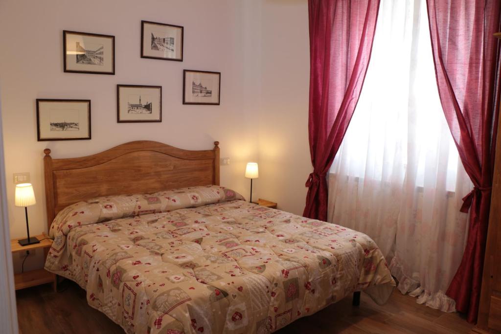 Łóżko lub łóżka w pokoju w obiekcie Agriturismo Terra dei Falchi