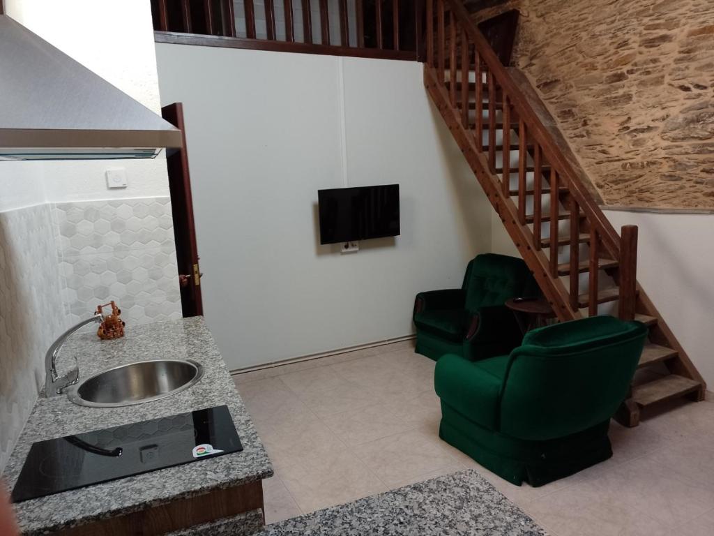 TV a/nebo společenská místnost v ubytování Casa Arza