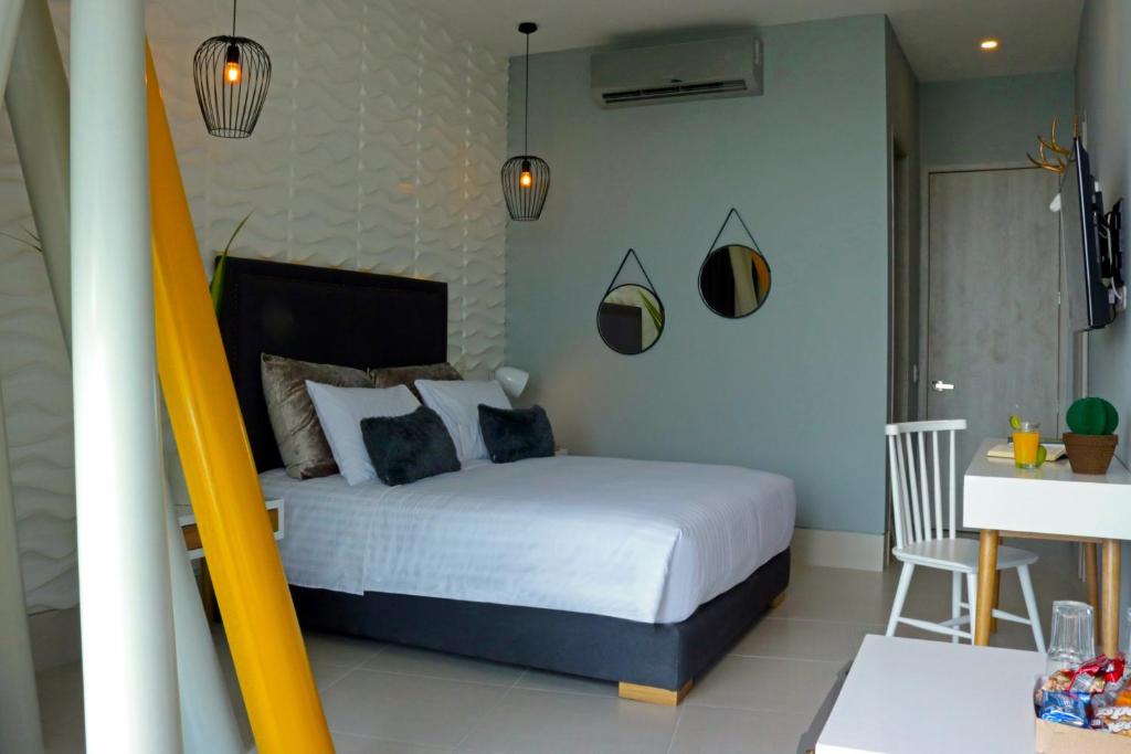 Postel nebo postele na pokoji v ubytování Bonita Bay Concept Hotel by Xarm Hotels