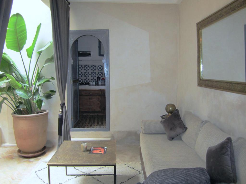 Posezení v ubytování Riad La Porte de l'oasis