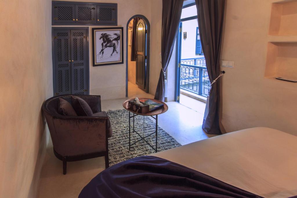Postel nebo postele na pokoji v ubytování Riad La Porte de l'oasis