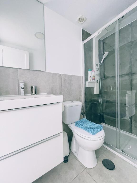 A bathroom at Blue Island Pool View & Wi-Fi by iRent Fuerteventura