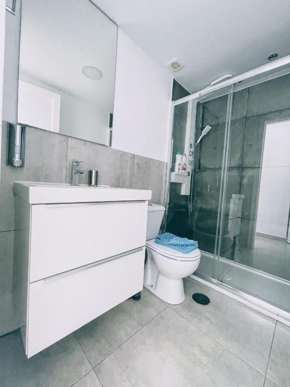 A bathroom at Blue Island Pool View & Wi-Fi by iRent Fuerteventura