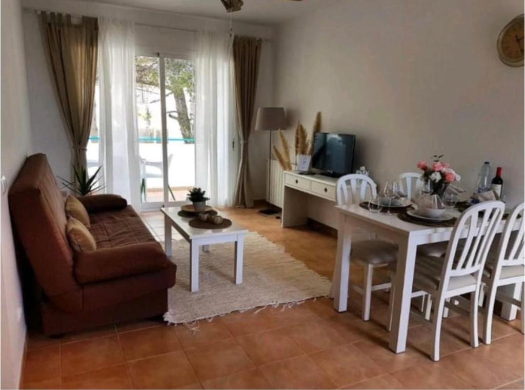 Zona de estar de Apartamentos Cala Angila