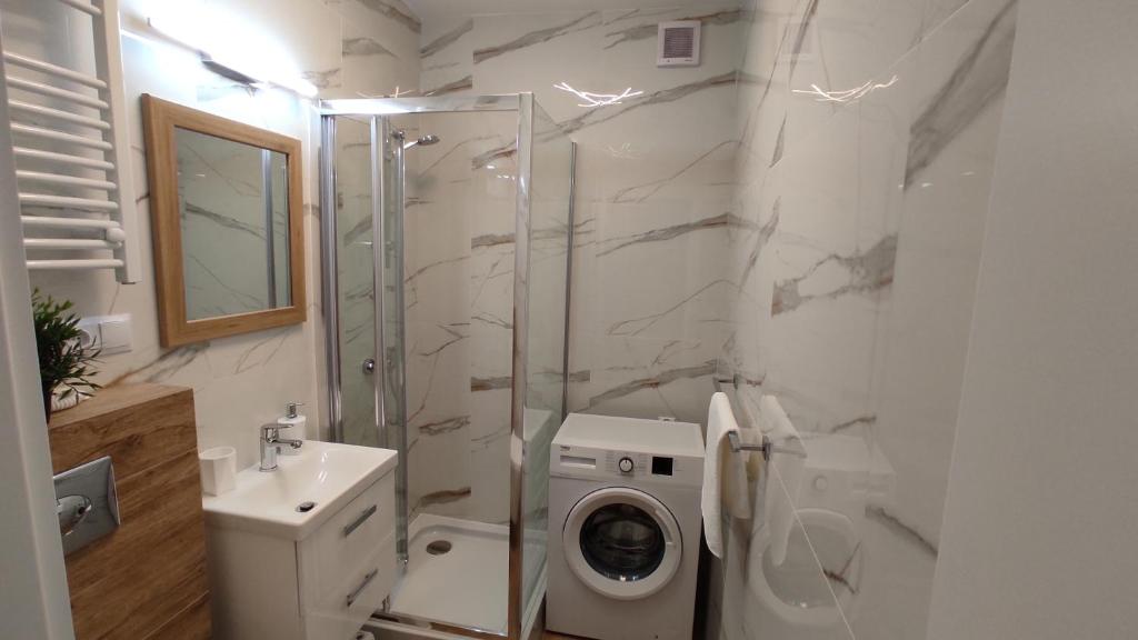 Kúpeľňa v ubytovaní Apartamenty AgPa7